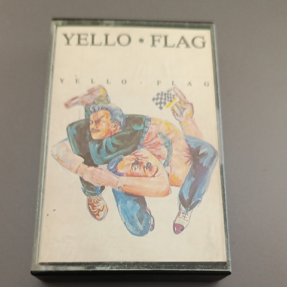 Yello Flag Cassette Tape